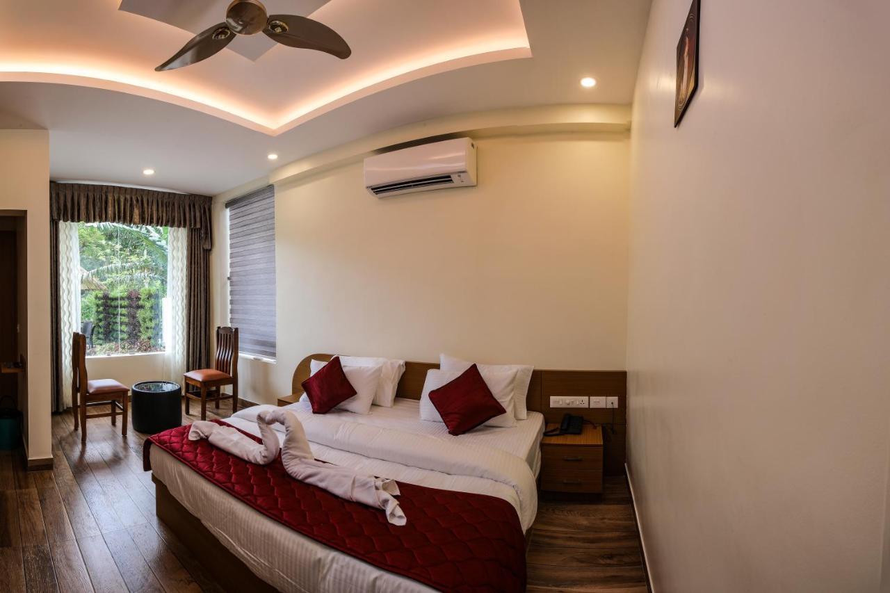 Thenmala Hormuz Inn Kolattupuzha Екстер'єр фото